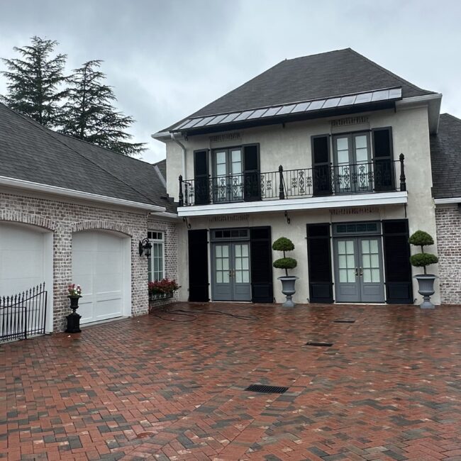 A professional helping a client prepare a home insurance claim.