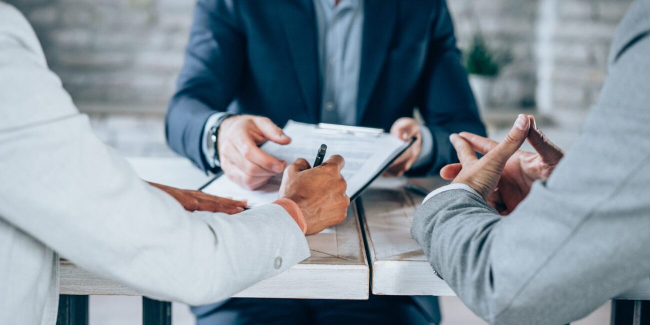 Couple meeting with financial advisor.