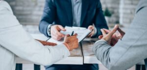 Couple meeting with financial advisor.